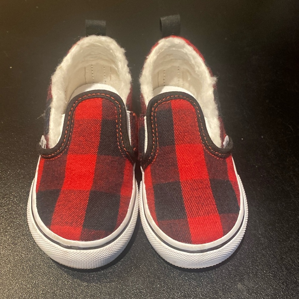 Vans, toddler, like new slip on checker board print with fleece lining.
